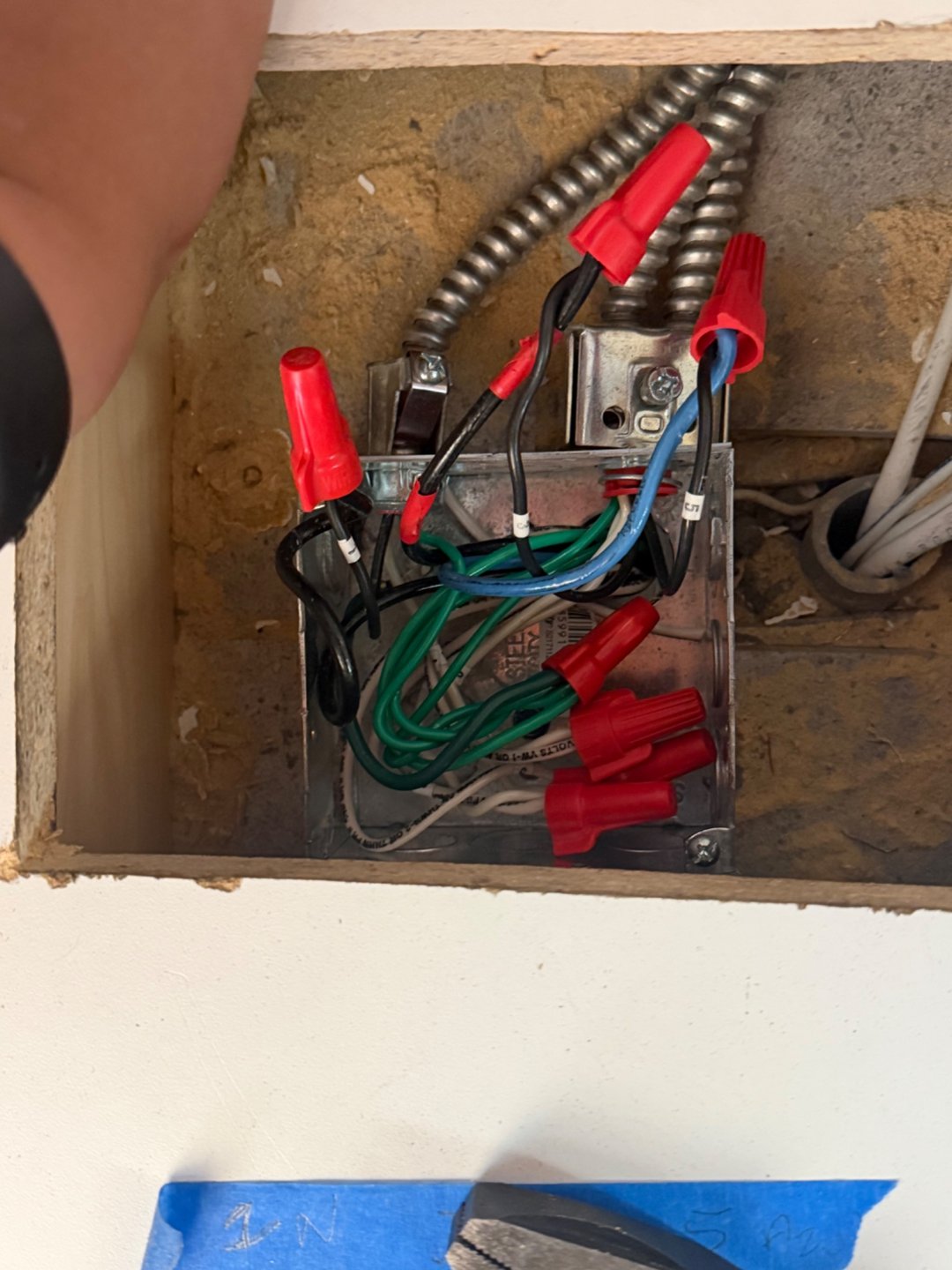 After separation and labeling: front-desk conductors identified by circuit, shown with the box still open for documentation.
